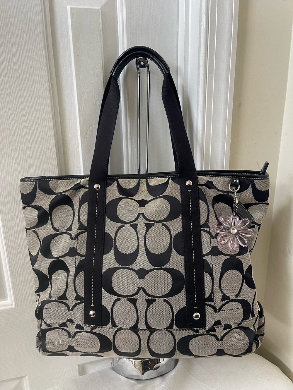 Coach Black and Cream Signature Canvas Tote with Floral Charm